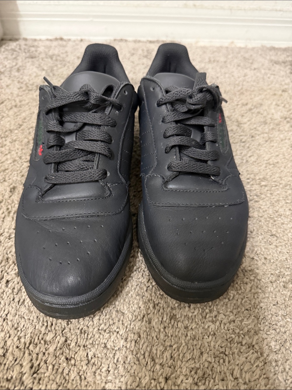 Adidas Men's Black Low-Top Sneakers with Subtle Red & Green Detail